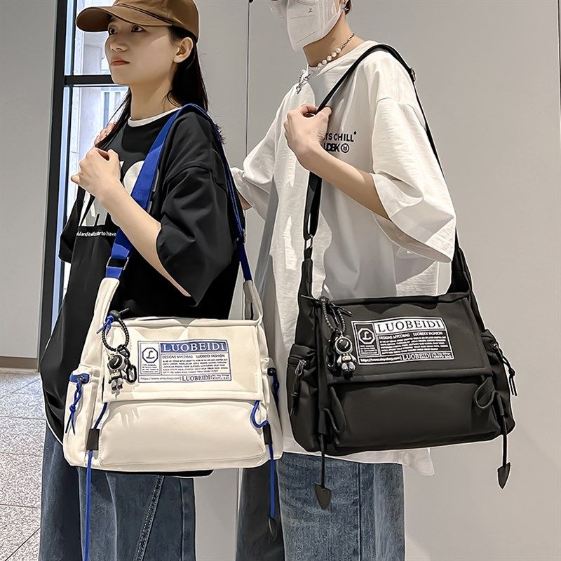 日系帆布包斜挎包男士大容量休闲工装邮差包女学生上课单肩包潮流