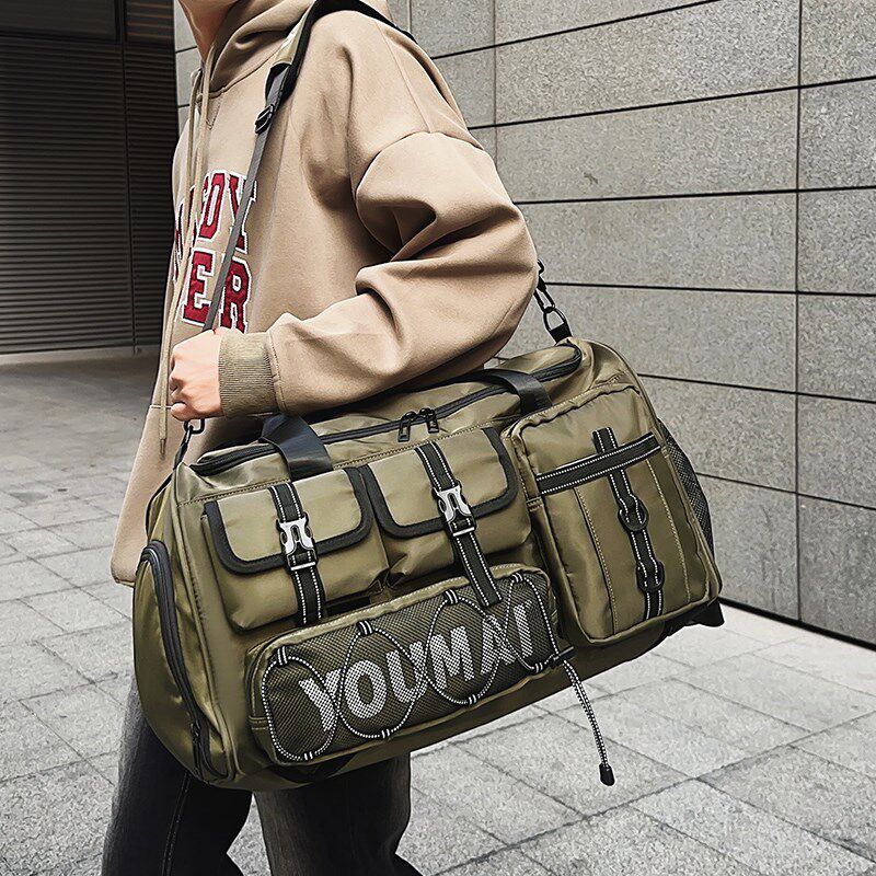 男士休闲旅游包短途外出旅行包轻便双肩包大容量黑包防水行李包男