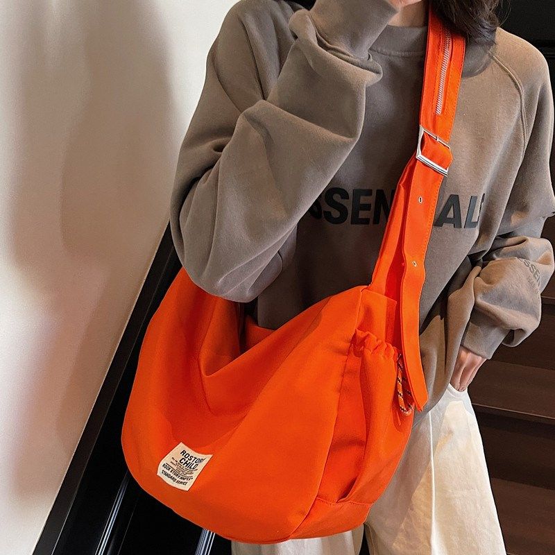 韩版斜挎包女大容量简约百搭休闲旅游骑行单肩背包健身包2025新款,箱包皮具/热销女包/男包,时尚帆布包,淘宝优惠券,粉丝福利购,淘宝优惠卷