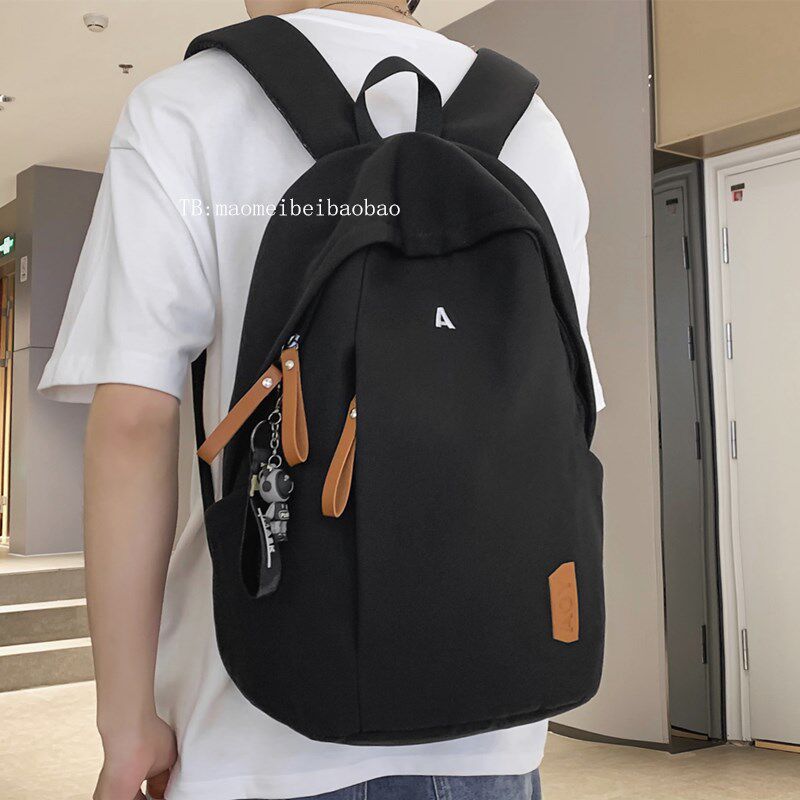 高中生书包男生大学生黑色电脑双肩包女高级感纯色旅行背包大容量