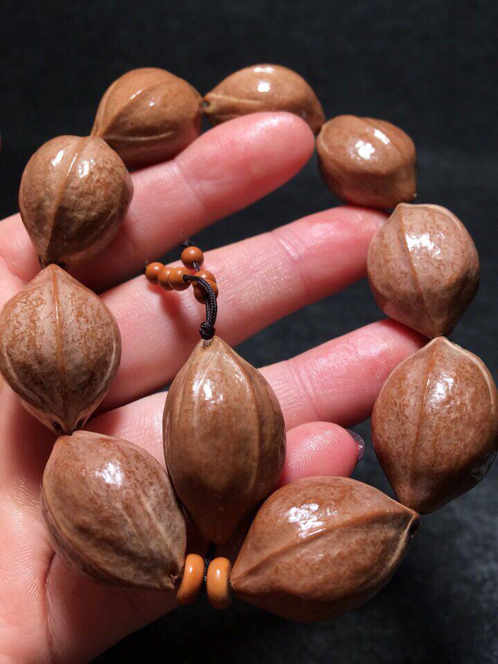 橄榄素雕梅林核铁手串核串