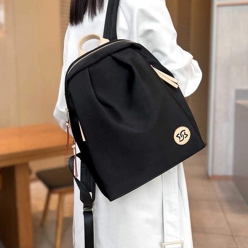 防水帆布双肩包女2024新款休闲C轻便百搭牛津背包大容量户外旅游
