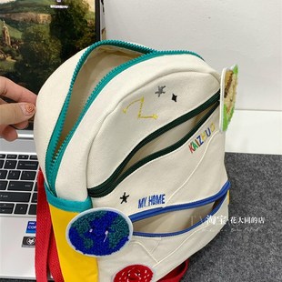 超可爱迷你双肩包女2023新款撞色卡通大学生幼儿园帆布小星球包包