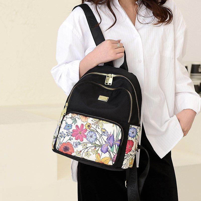 牛津布双肩包女2024新款时尚背包防水轻便休闲旅游中老年妈妈书包