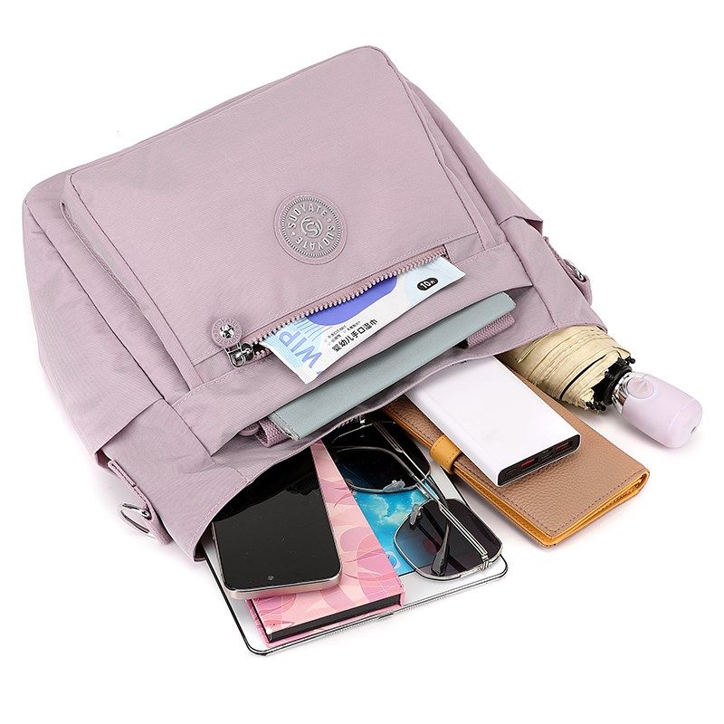 帆布包女包2024秋冬百搭通勤手提单肩斜挎包大容量中老年休闲背包