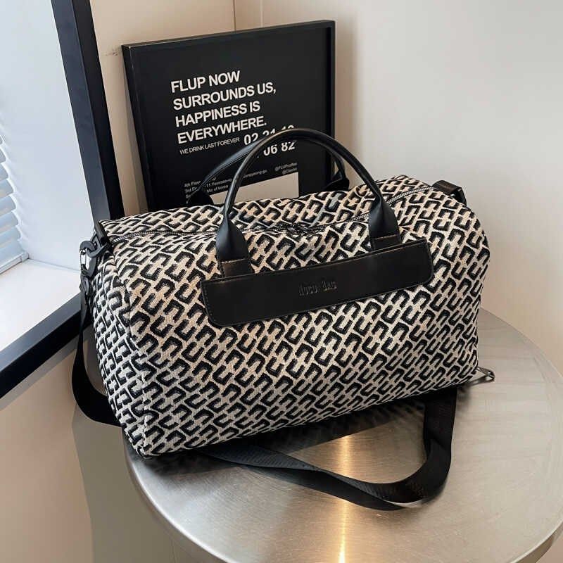 旅行包包女帆布手提包大容量行李包轻便旅游收纳袋待产时尚健身包,箱包皮具/热销女包/男包,旅行袋,淘宝优惠券,粉丝福利购,淘宝优惠卷