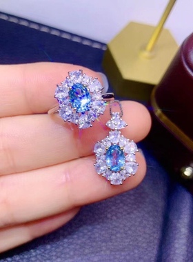 925银精工镶嵌瑞士蓝托帕石戒指