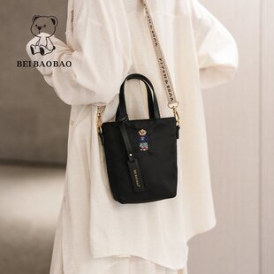 北包包2025新款原创小众通勤手拎斜挎包休闲尼龙布卡通刺绣手机包