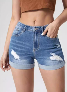 Punched and curled high stretch high waisted denim shorts
