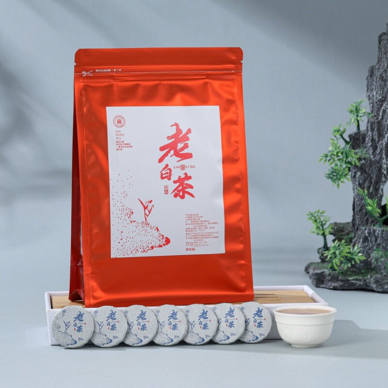 正宗福鼎白茶老白茶寿眉茶饼独立包装紧压茶花茶自己喝茶叶小圆饼