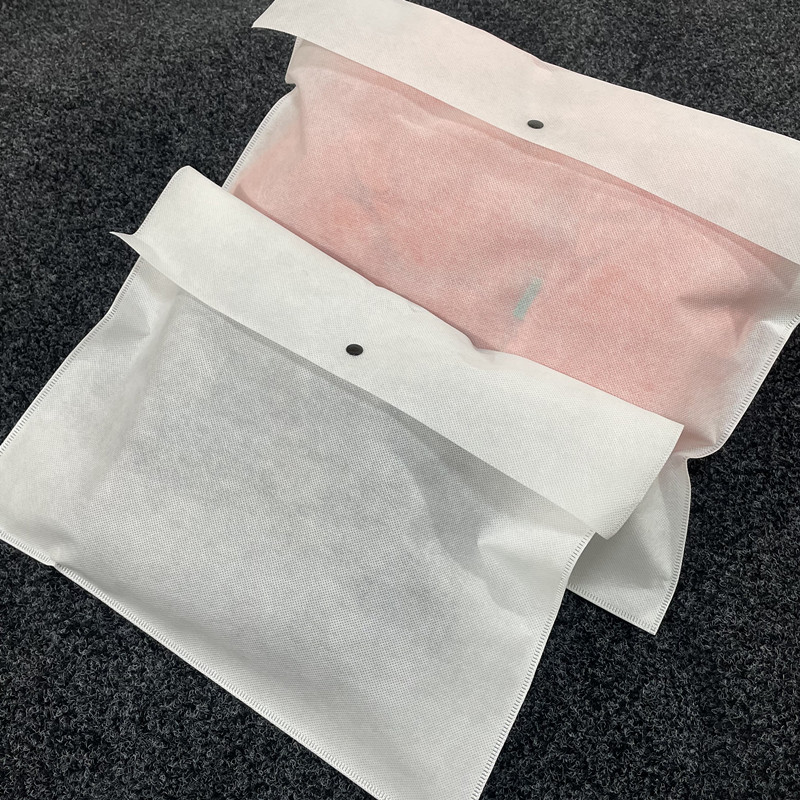 现货有按扣无纺布暗扣袋透气不织布服装防尘收纳袋衣服包装黑白色