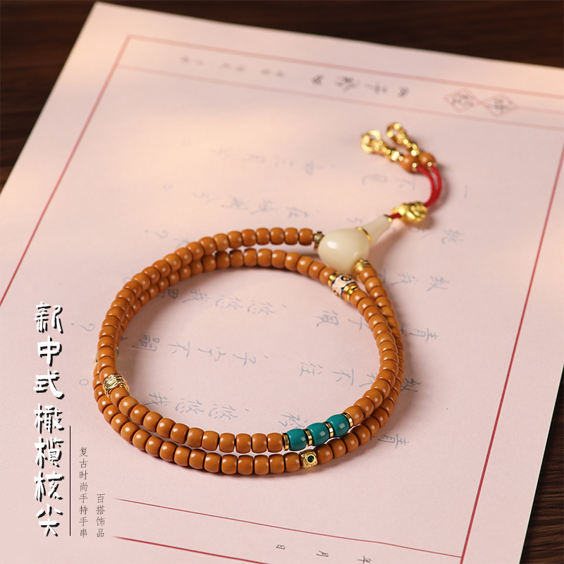 归圆珠手串橄榄核尖手持款干练沉稳饰品男女同款包金琉璃桶珠配饰