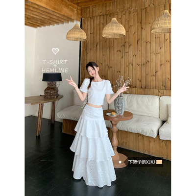 简约白色减龄套装女夏季2025新款泡泡袖短款上衣蛋糕半身裙两件套