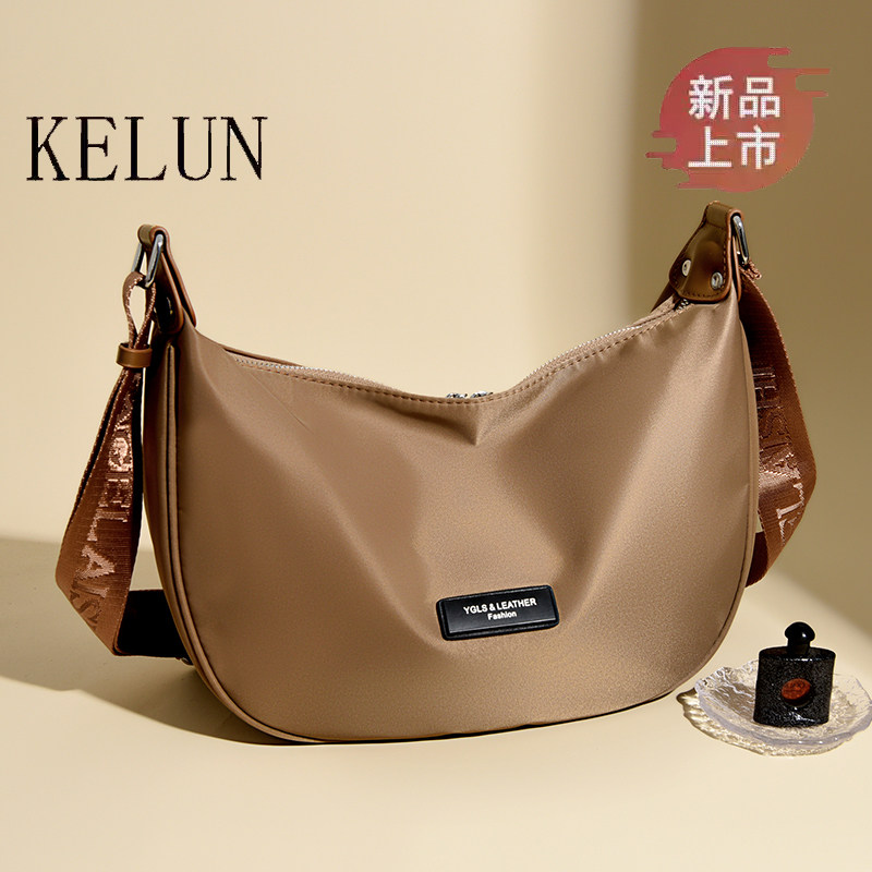 雅格莱诗2026新款牛津布女包休闲斜挎饺子包防水大容量百搭月牙包