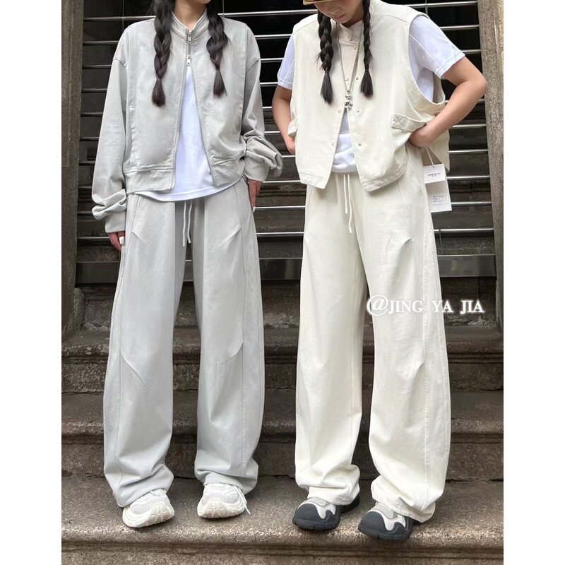 JYJ静雅83071夏季新款时尚宽松大码胖mm休闲褶皱拼接薄款弯刀卫裤