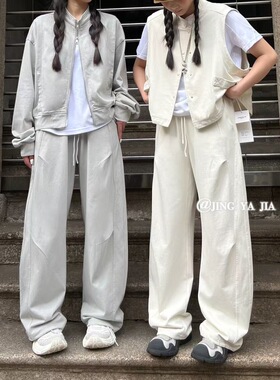 JYJ静雅83071夏季新款时尚宽松大码胖mm休闲褶皱拼接薄款弯刀卫裤