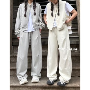 JYJ静雅83071夏季新款时尚宽松大码胖mm休闲褶皱拼接薄款弯刀卫裤