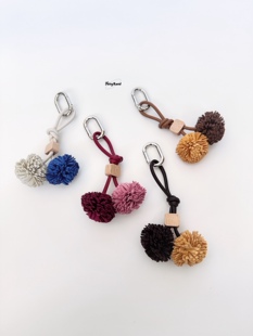 麂皮流苏毛球miu系包包挂件通勤钥匙扣ins风简约挂饰衣服配饰秋冬