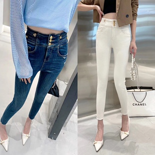 欧洲站加绒高腰金属水钻小纽扣棉弹显瘦白色小脚牛仔裤靴裤时髦精