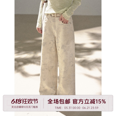 米色提花胶点牛仔裤长裤