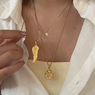 734钛钢加长毛衣链珍珠多层叠搭锁骨链天使翅膀人像钱币吊坠项链