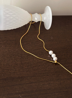 734钛钢抽拉蛇骨y字毛衣链加长珍珠项链金色可洗澡