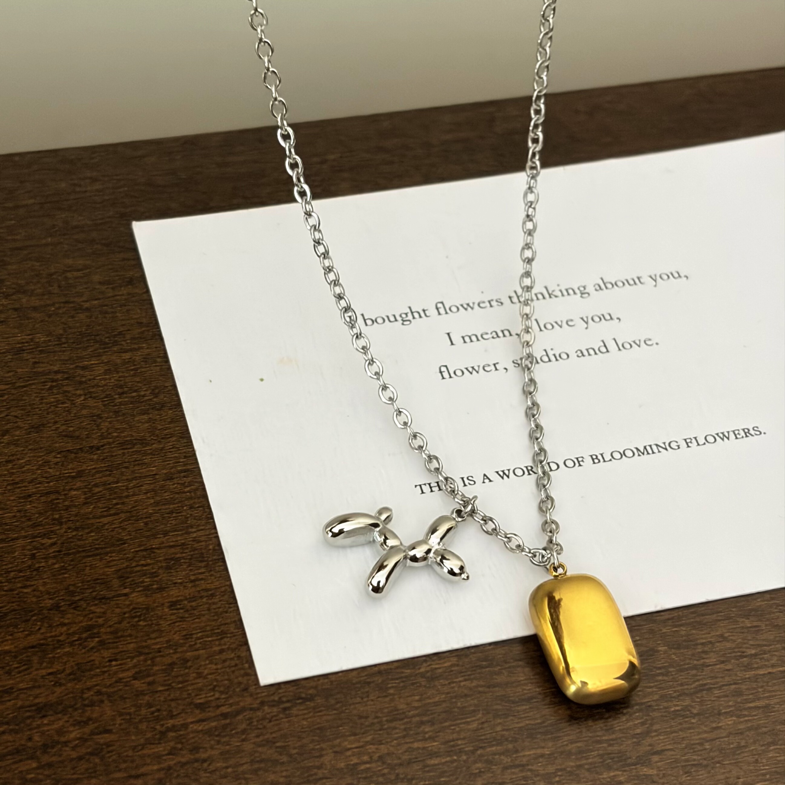 734钛钢不掉色拼色气球小狗重洗澡不用摘可定制加长毛衣链