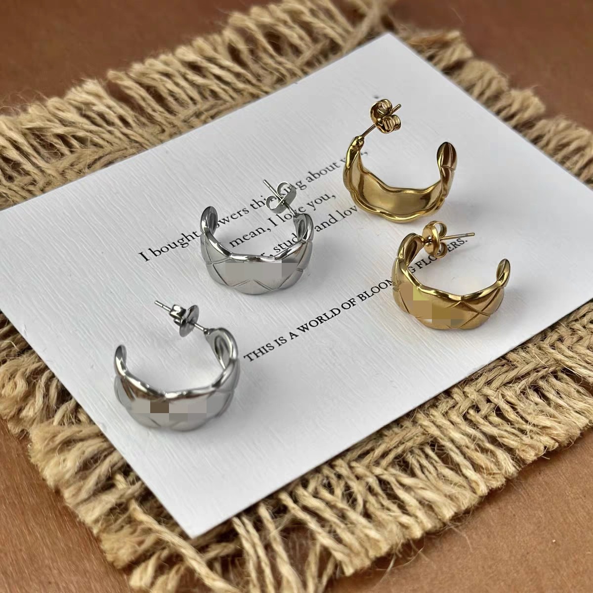 可洗澡耳环钛钢休闲菱格