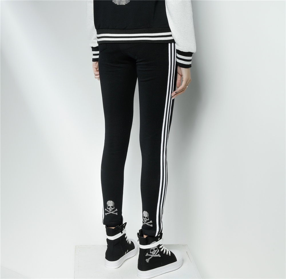 骷髅水钻九分外穿打底裤