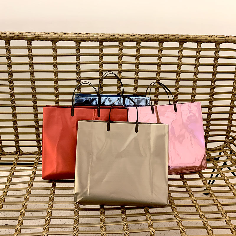 金属镭射免税店袋叉耳礼品手提服装店袋防水高档加印logo包装袋子