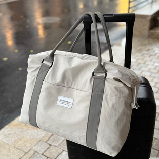 大容量旅行包女手提出差行李袋男2025热卖短途轻便可折叠上飞机包