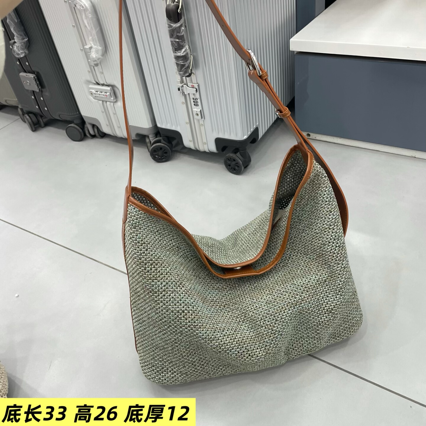 飞织绿色拼接牛皮女包2026新款时尚休闲质感欧美斜挎包慵懒包潮