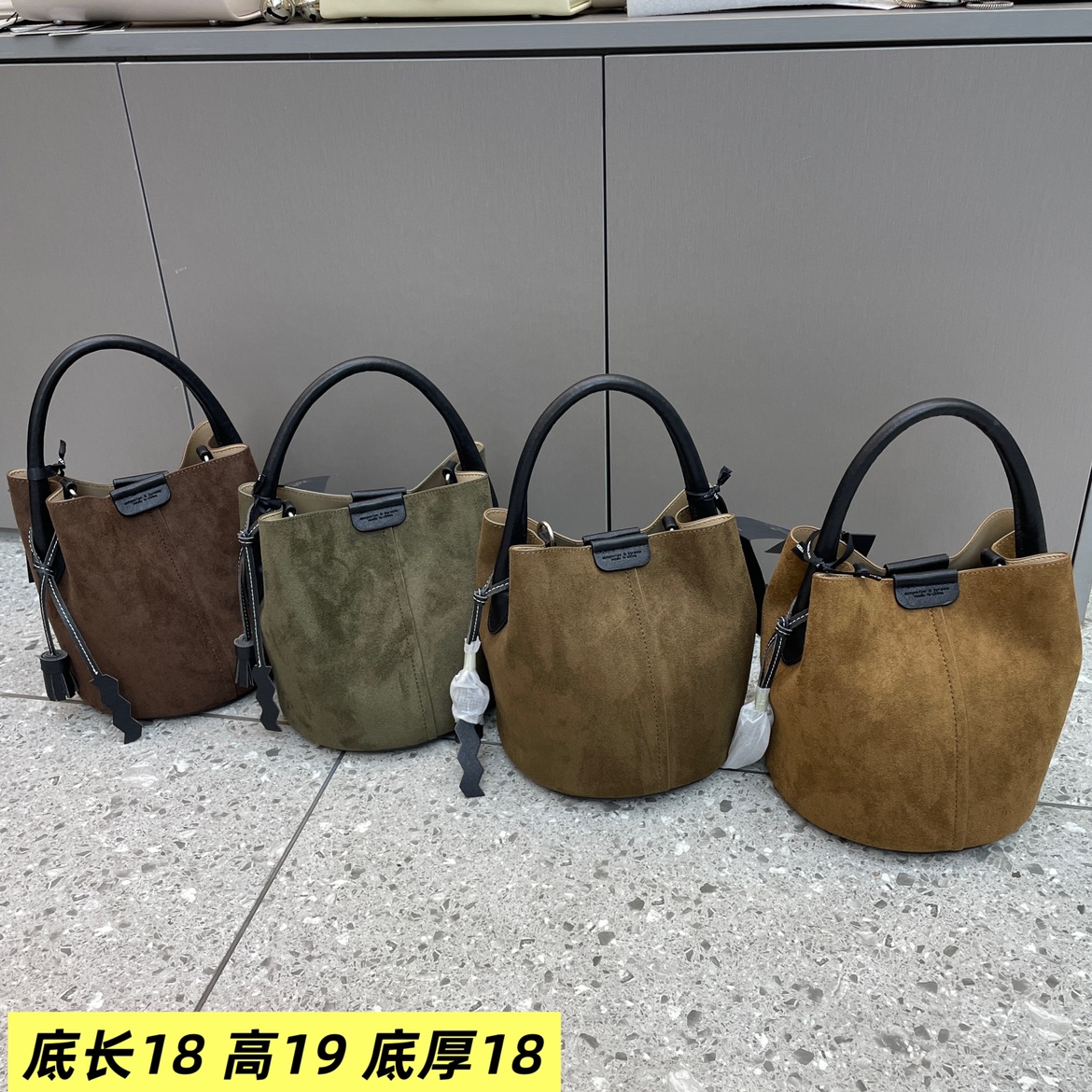 爆款磨砂绒撞色水桶女包2025新款时尚欧美气质韩版手提单肩斜挎包