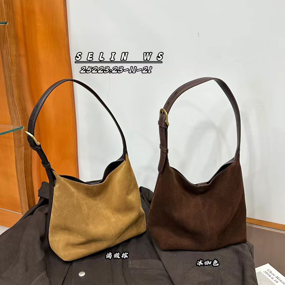 磨砂皮休闲慵懒水桶女包2025新款时尚欧美气质小众韩版斜挎潮包