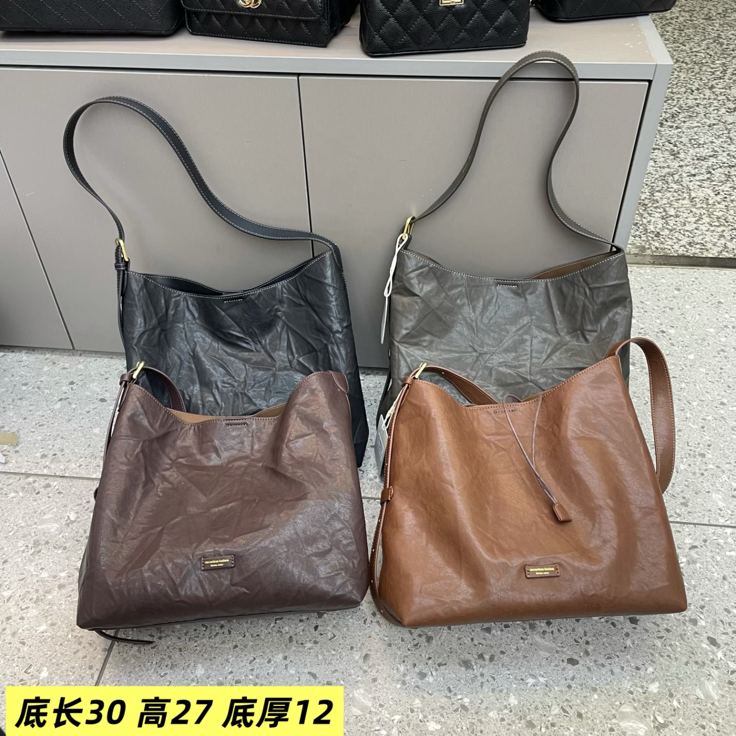 手抓纹水桶女包2026新款洋气休闲欧美韩版大气潮流单肩斜挎包潮