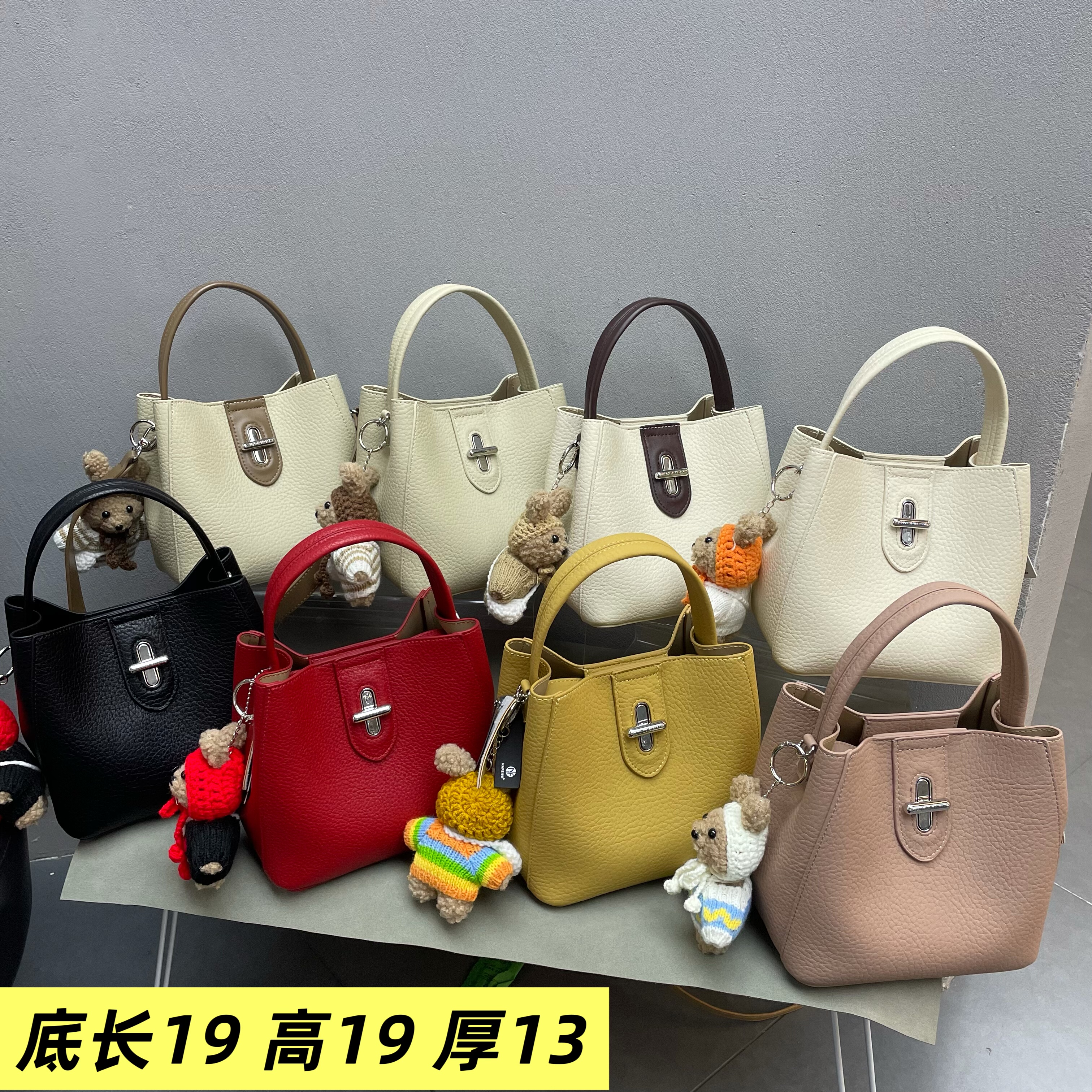 荔枝皮撞色手提水桶时尚女包2026新款潮流韩版休闲简约单肩斜挎包