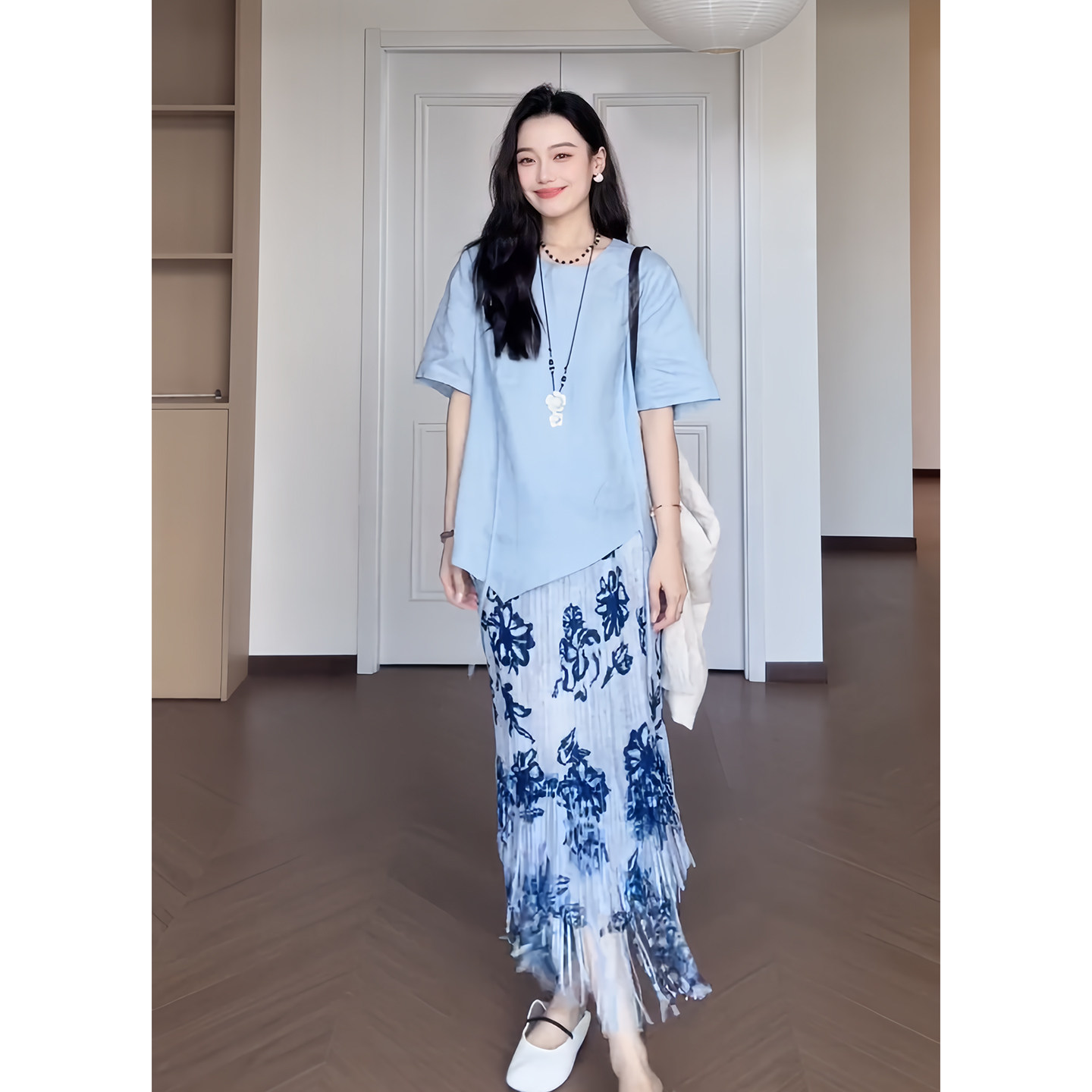 不规则短袖上衣流苏半身裙套装图片