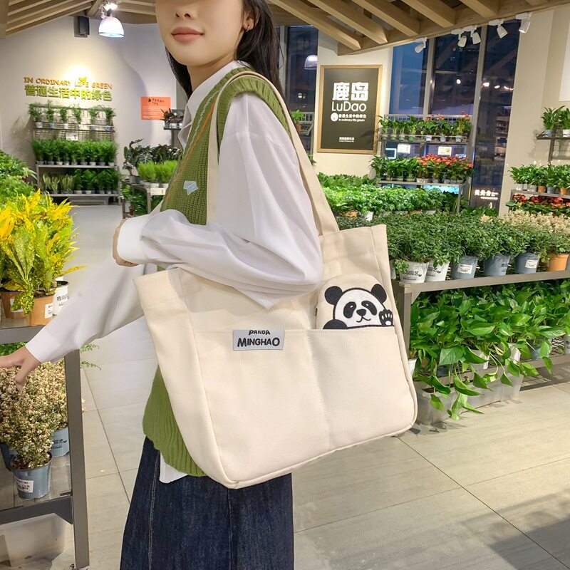 新款女士单肩包大容量简约时尚手提包都市敞口纯色可爱熊猫帆布包