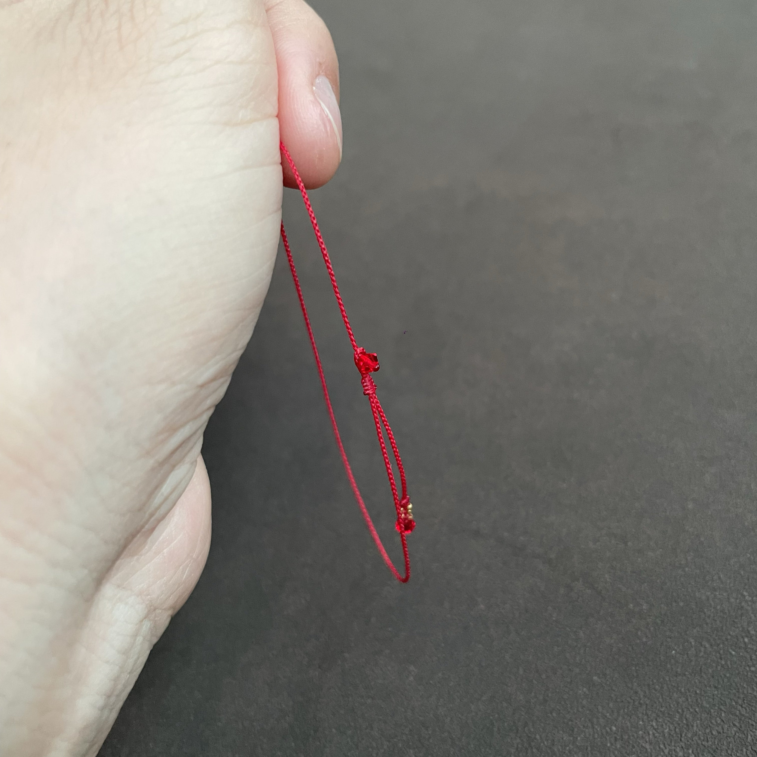 18kmini金珠红水晶极细编织本命年手链