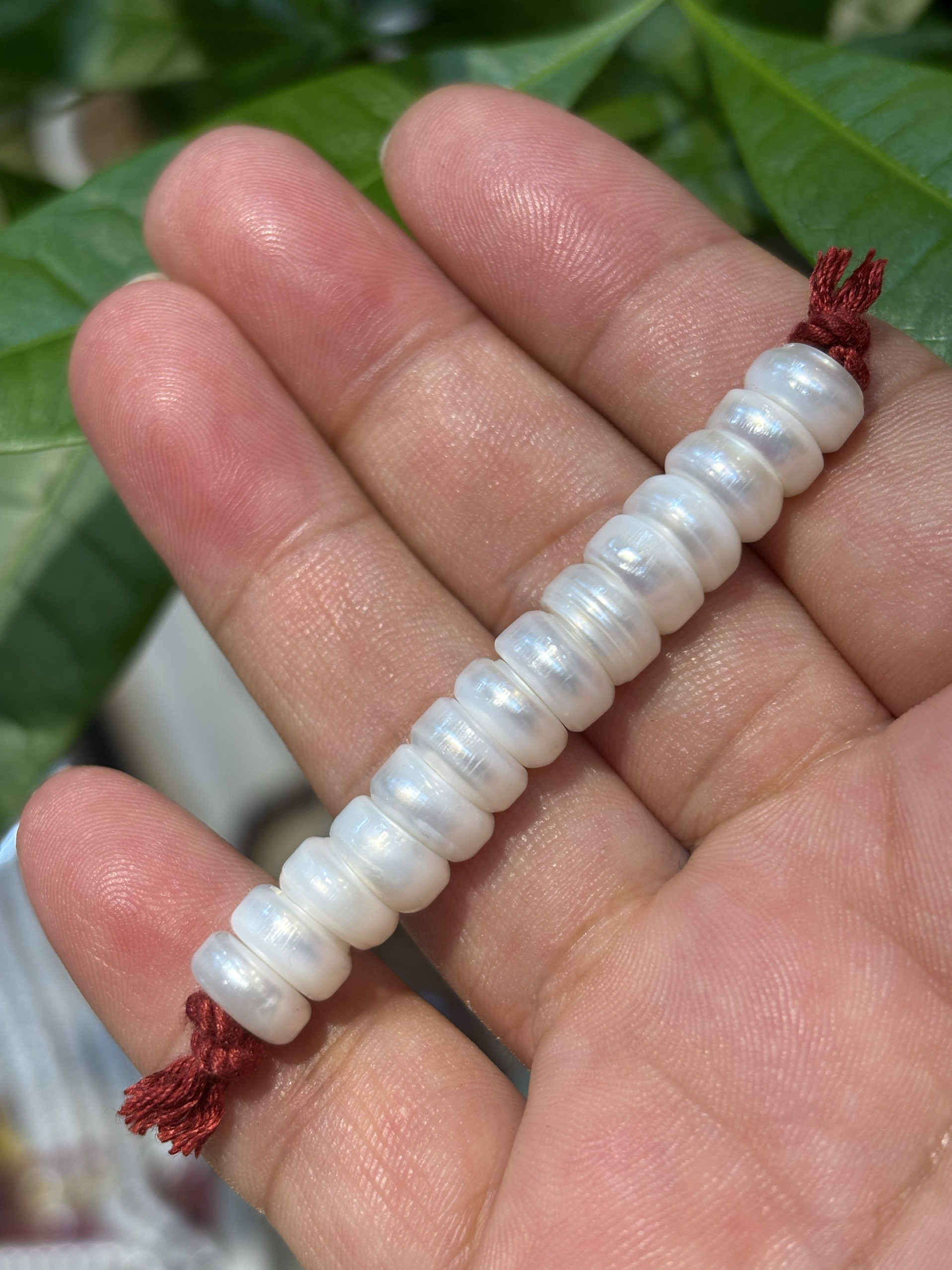 特价出一组藏区老珍珠隔片14片 直径8.5