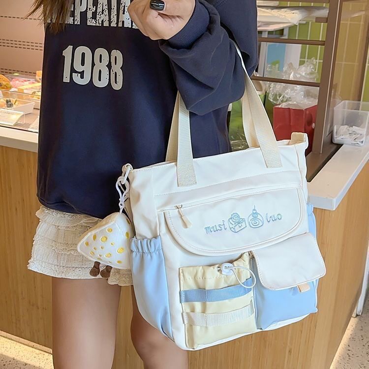 少女学院风手提单肩包包女初中高中生学生上课包补习袋休闲斜挎包