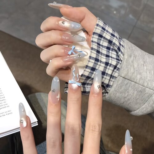 冰透猫眼奶蓝色渐变蝴蝶结美甲