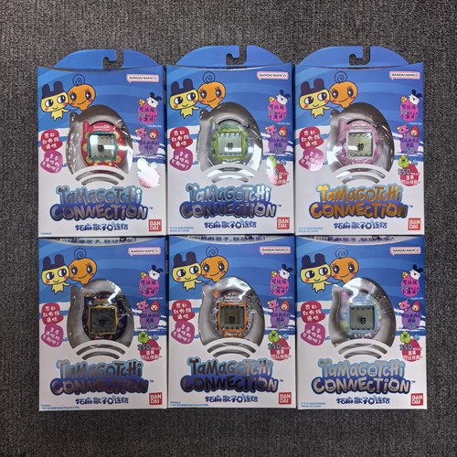 万代tamagotchi拓麻歌子电子宠物机霓虹星球时光流彩连结游戏机