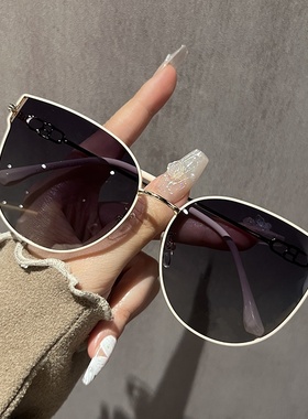 金属新款猫眼太阳镜女时尚出游防晒墨镜防紫外线感偏光太阳镜
