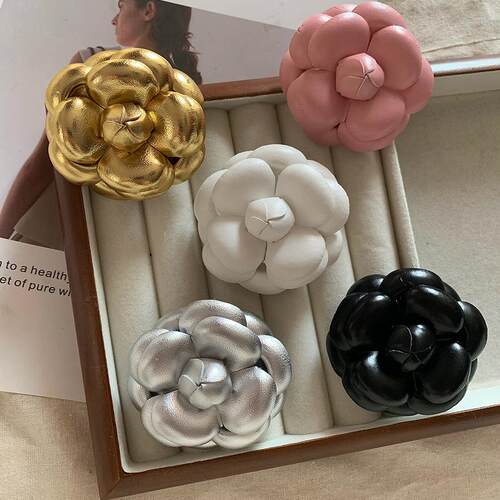 1000SE高端超定型金色胸花真皮