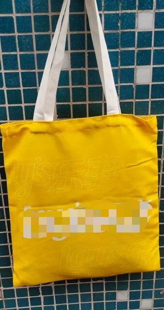 赠品黄色加厚涤纶布环保购物袋子超市买菜包便携手提单肩结实