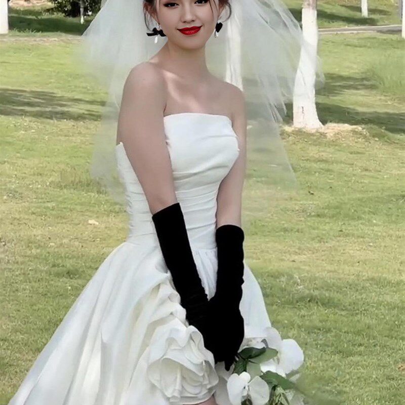 影楼新款拍照旅拍主题服装时尚街拍婚纱摄影外景前短后长拖尾礼服