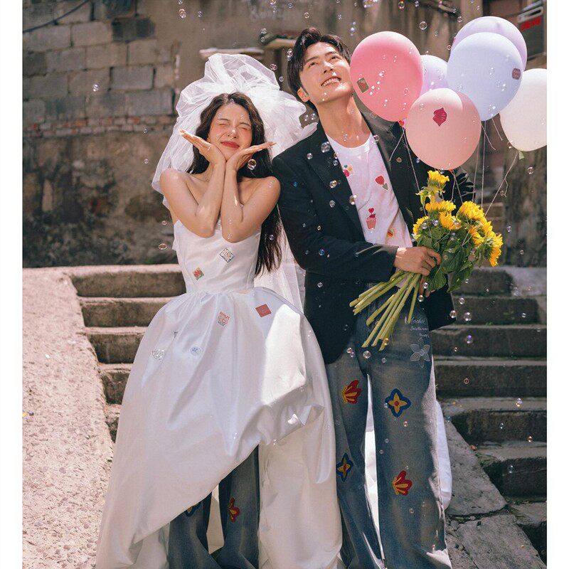 影楼新款拍照旅拍主题服装时尚街拍婚纱摄影外景前短后长拖尾礼服