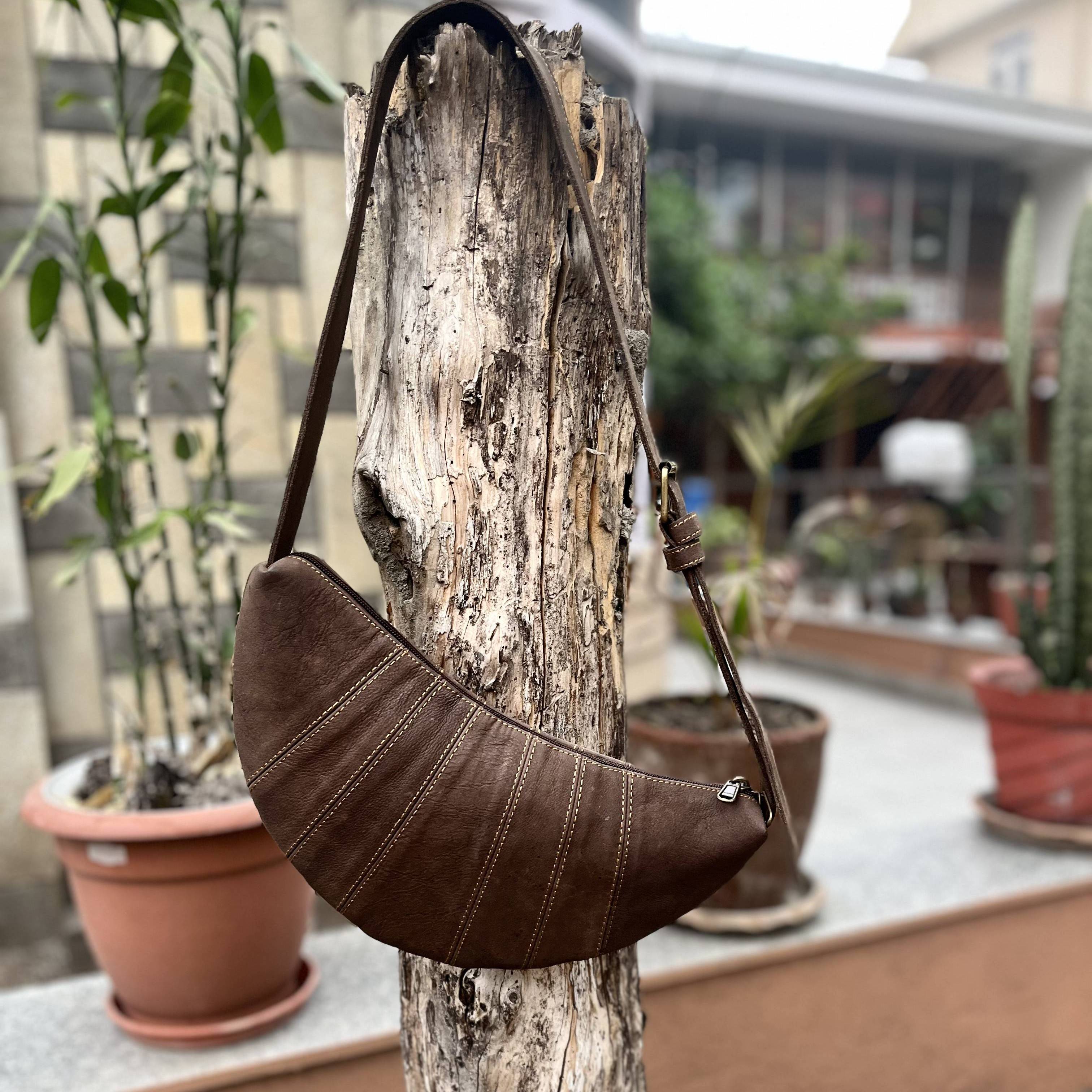 尼泊尔手工植鞣头层牦牛皮单肩月牙包