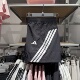 KE5852 运动训练短裤 正品 ADIDAS阿迪达斯女子三条杠梭织透气热裤